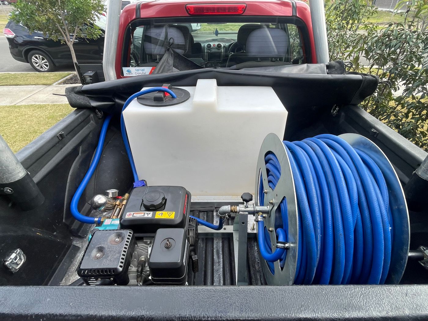 Jenkos Pest Control truck-mounted high-pressure spray rig for hard to reach areas